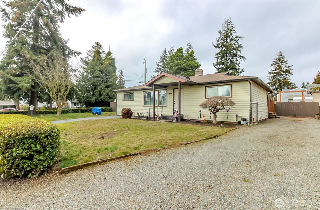 Photo of 1332 SW 113th Street, Seattle, WA 98146 (MLS # 2318592)