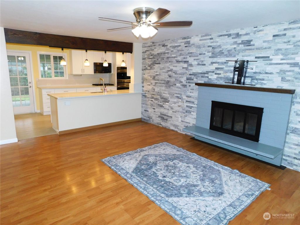 Photo of 4308 NE 19th Street, Renton, WA 98059 (MLS # 2323622)