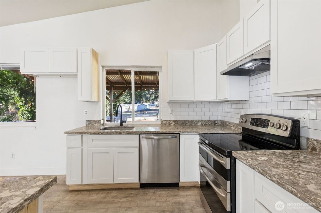 Photo of 1203 160th Street Ct E, Tacoma, WA 98445 (MLS # 2443600)