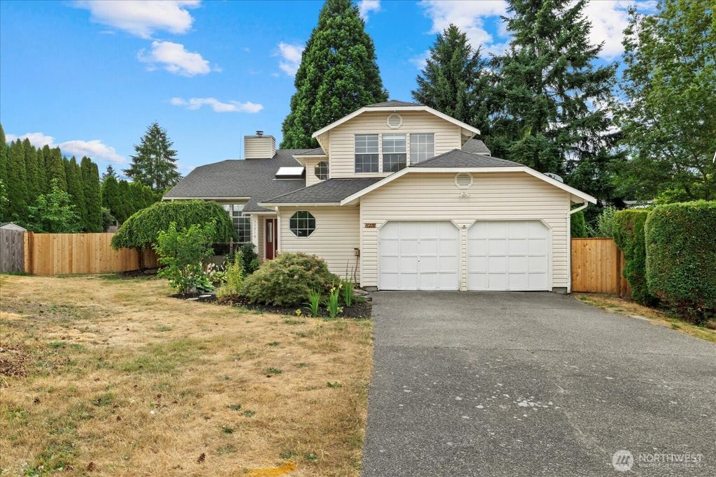 Photo of 11210 SE 219th Place, Kent, WA 98031 (MLS # 2408651)