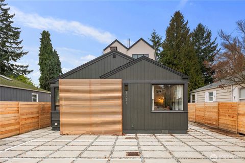 Photo of 8731 13th Avenue NW, Seattle, WA 98117 (MLS # 2490442)