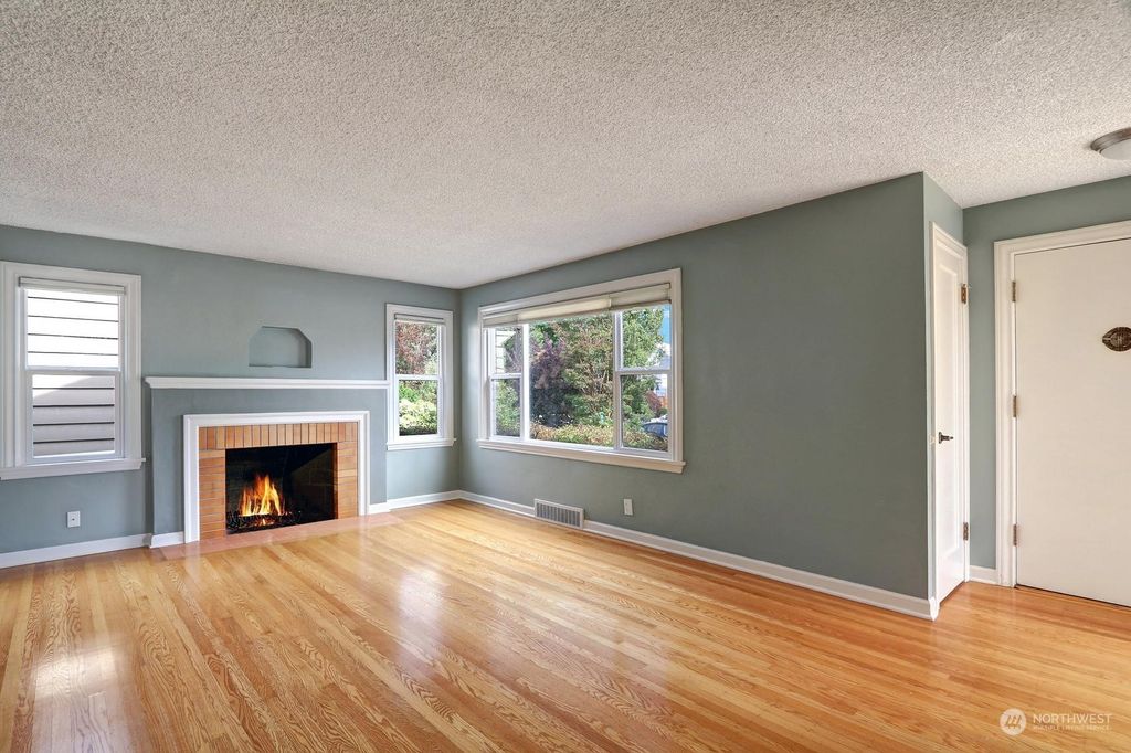 Photo of 7545 Mary Avenue NW, Seattle, WA 98117 (MLS # 2166068)