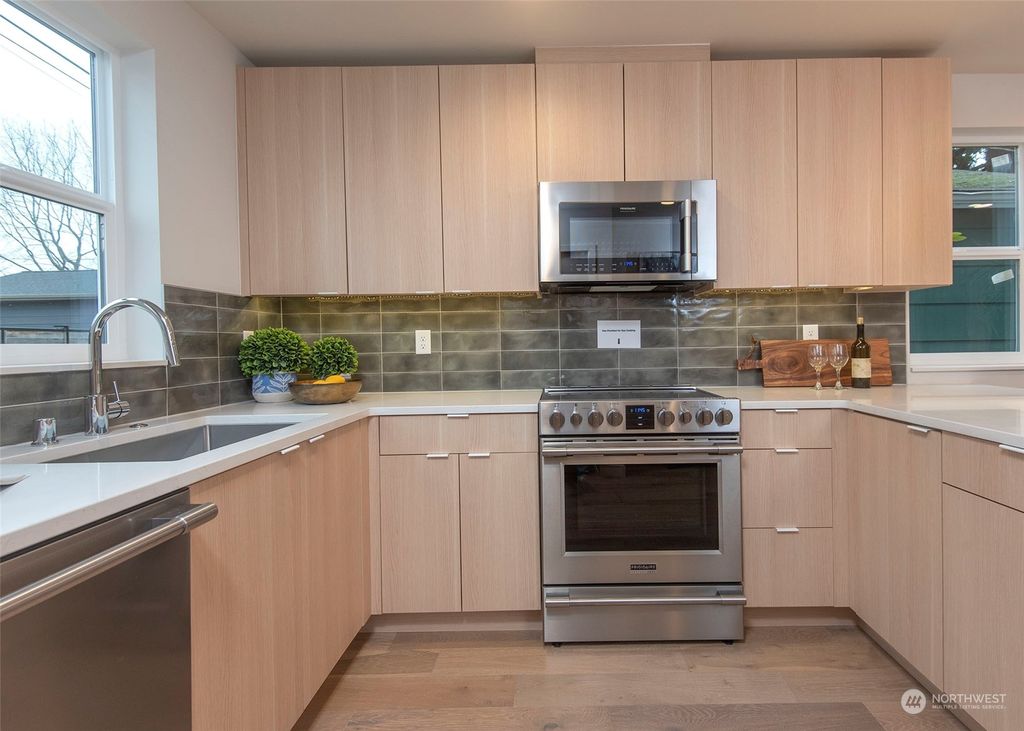 Photo of 4848 50th Avenue SW, Seattle, WA 98116 (MLS # 2030592)