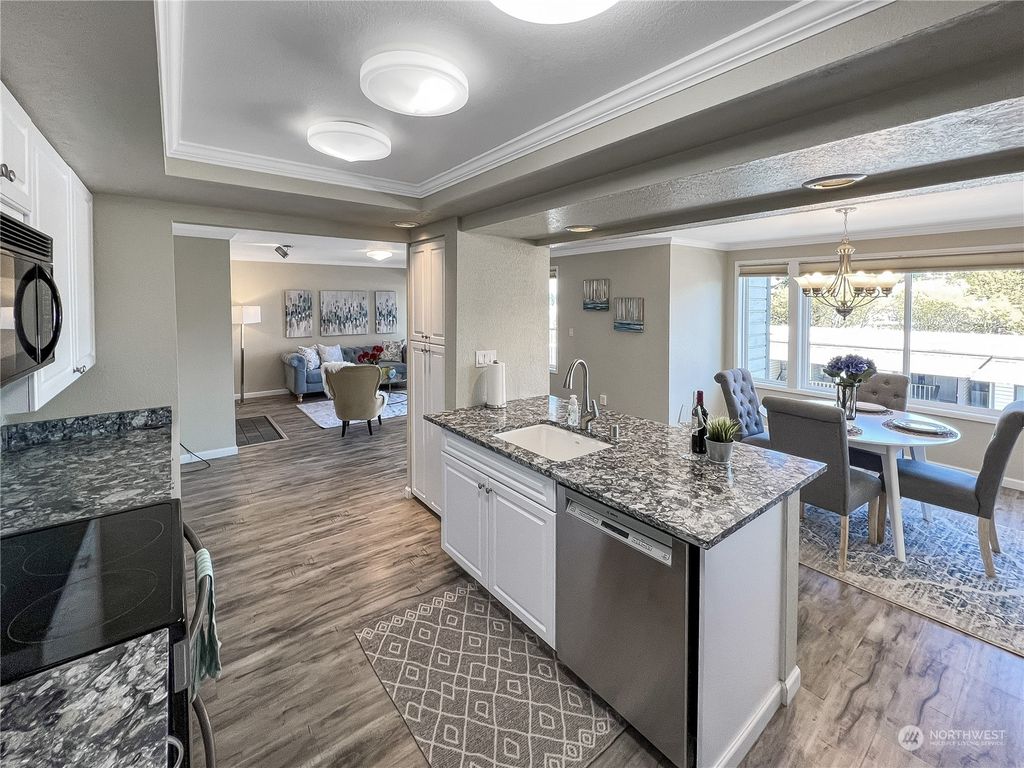 Photo of 2930 76th Avenue SE #A-302, Mercer Island, WA 98040 (MLS # 2057789)