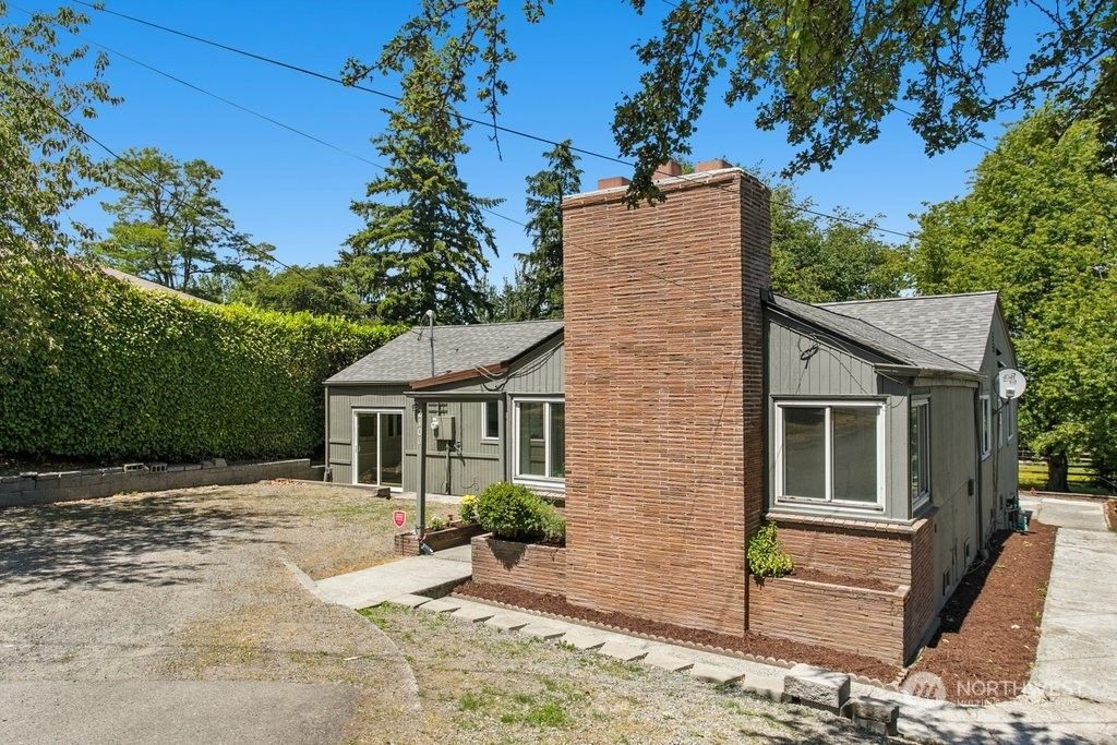 Photo of 2100 S 120th Street, Seattle, WA 98168 (MLS # 2255060)