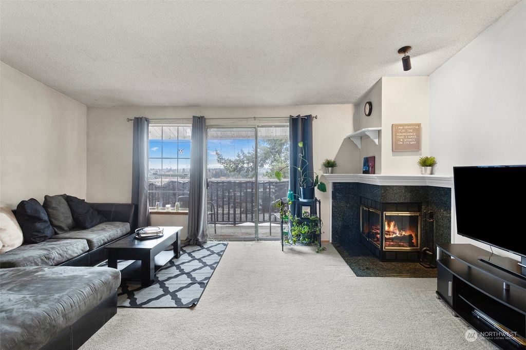 Photo of 127 SW 154th St St #303, Burien, WA 98166 (MLS # 2201585)