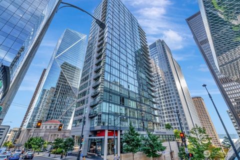 Photo of 909 5th Ave Ave #502, Seattle, WA 98104 (MLS # 2399240)