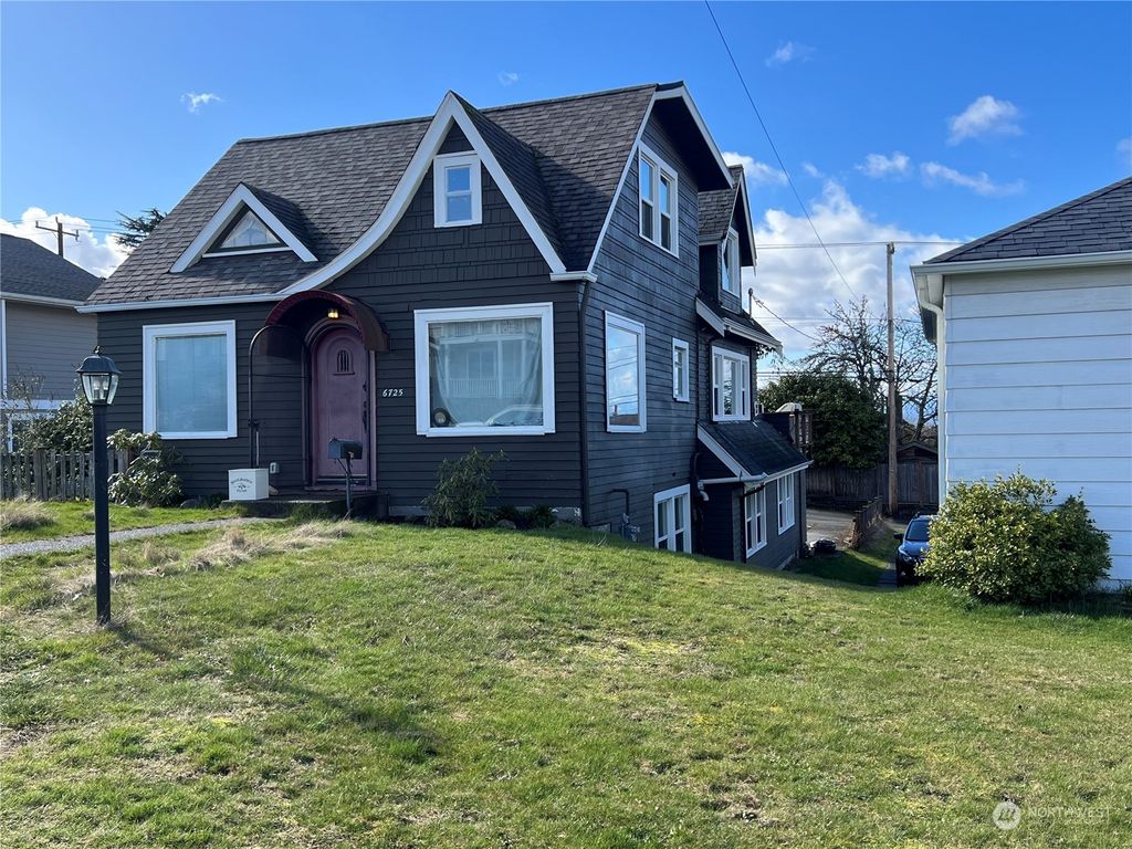 Photo of 6725 36th Avenue SW, Seattle, WA 98126 (MLS # 2042215)
