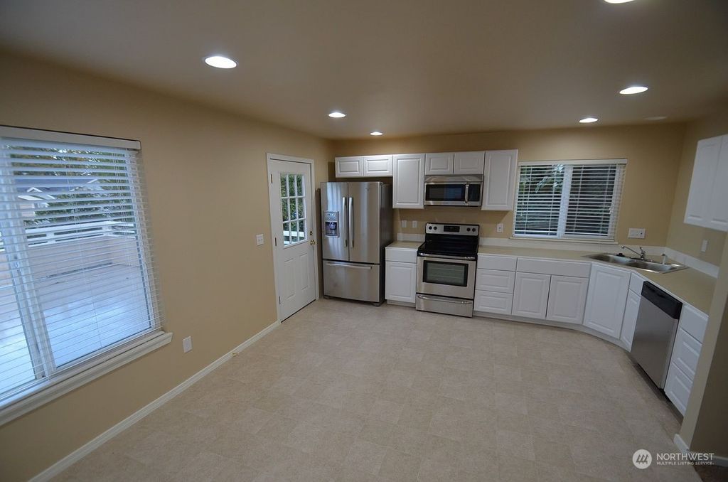 Photo of 10031 61st Avenue S, Seattle, WA 98178 (MLS # 2027789)