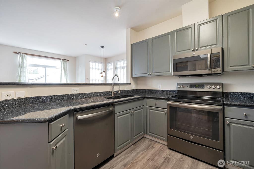 Photo of 17656 134th Lane SE #F17656, Renton, WA 98058 (MLS # 2571109)