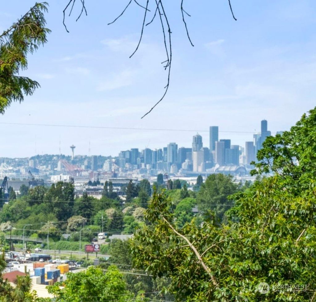 Photo of 1200 S 100th Street, Seattle, WA 98168 (MLS # 2145069)