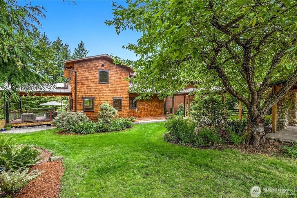 Photo of 6450 NE Brigham Road, Bainbridge Island, WA 98110 (MLS # 2500289)