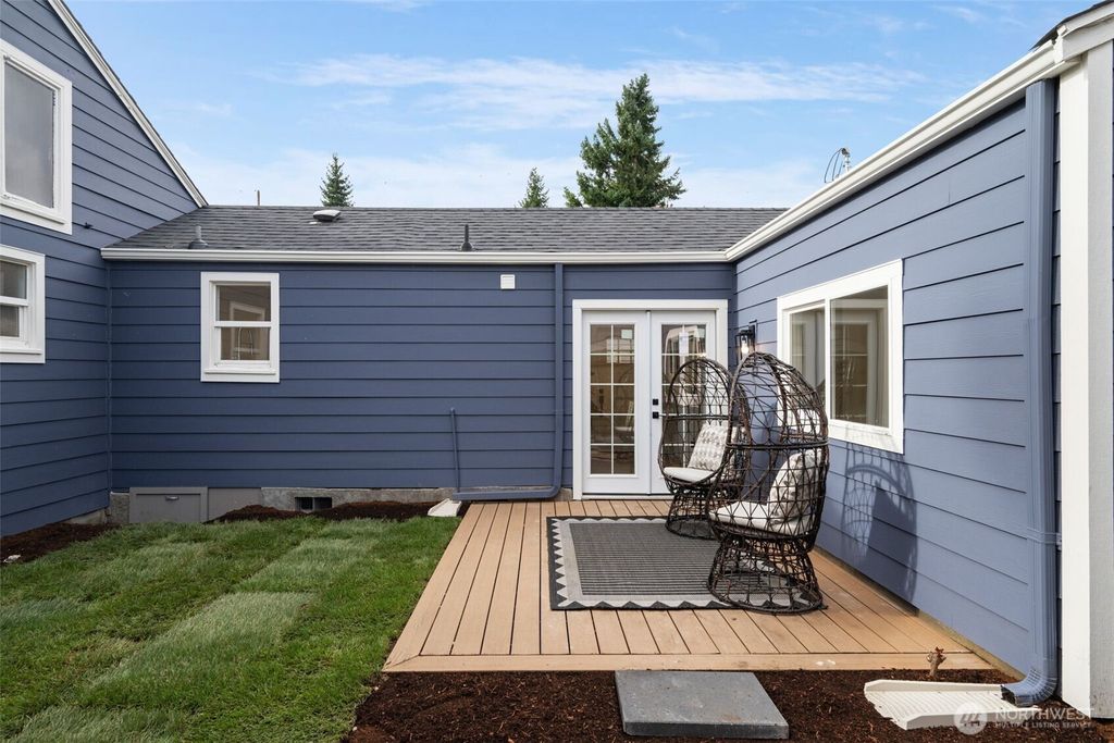 Photo of 704 N 104th Street, Seattle, WA 98133 (MLS # 2488389)