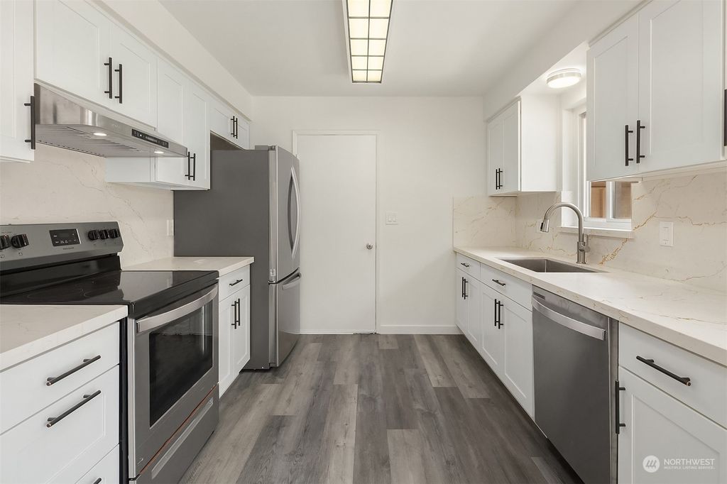 Photo of 111 S 112th Street, Seattle, WA 98168 (MLS # 2155201)