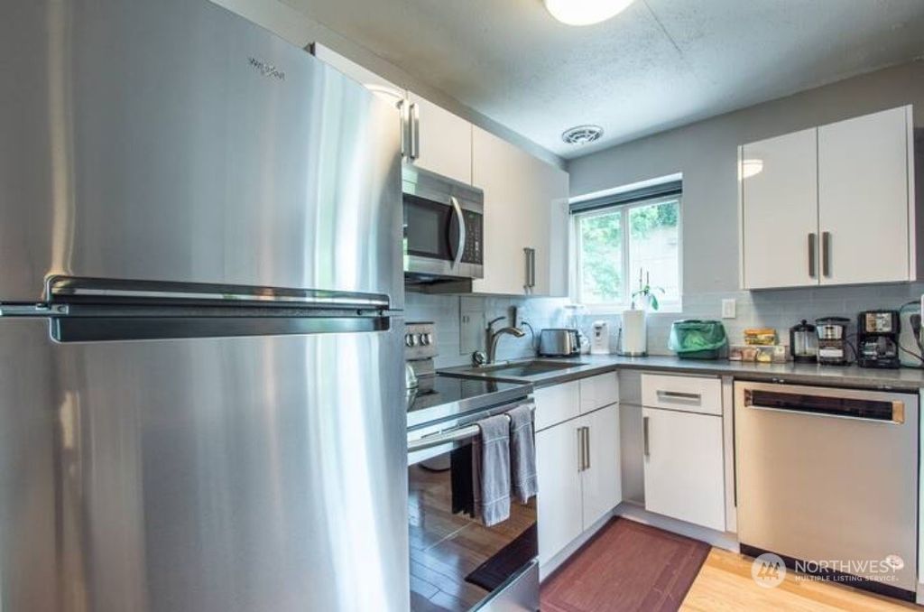 Photo of 1400 Hubbell Place #410, Seattle, WA 98101 (MLS # 1998135)