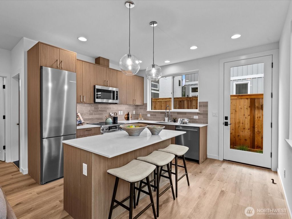 Photo of 9017 Dibble Avenue NW #B, Seattle, WA 98117 (MLS # 2380535)