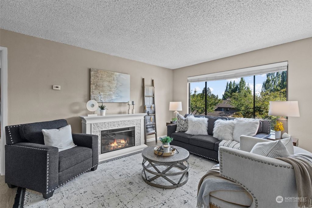 Photo of 10701 Glen Acres Drive S #10701, Seattle, WA 98168 (MLS # 2150821)