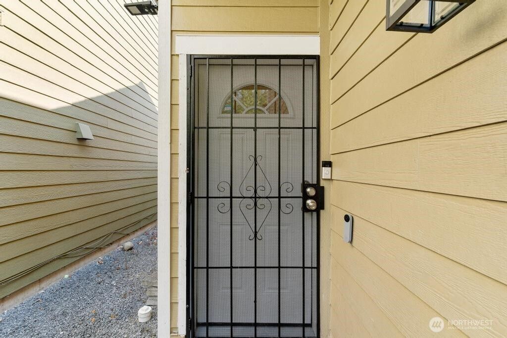 Photo of 11415 6th Avenue E, Tacoma, WA 98445 (MLS # 2488799)