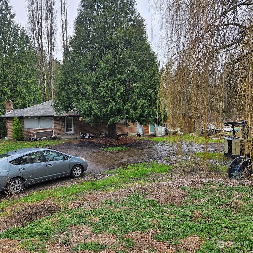 Photo of 19223 Talbot Road S, Renton, WA 98055 (MLS # 2199238)