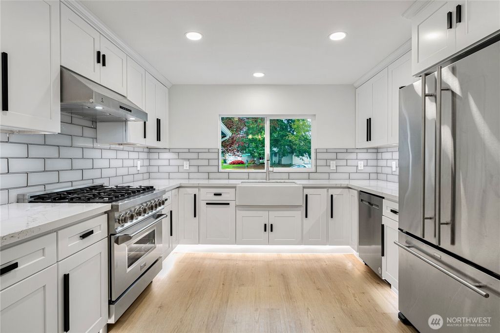 Photo of 12032 SE 210th PL Pl, Kent, WA 98031 (MLS # 2364014)