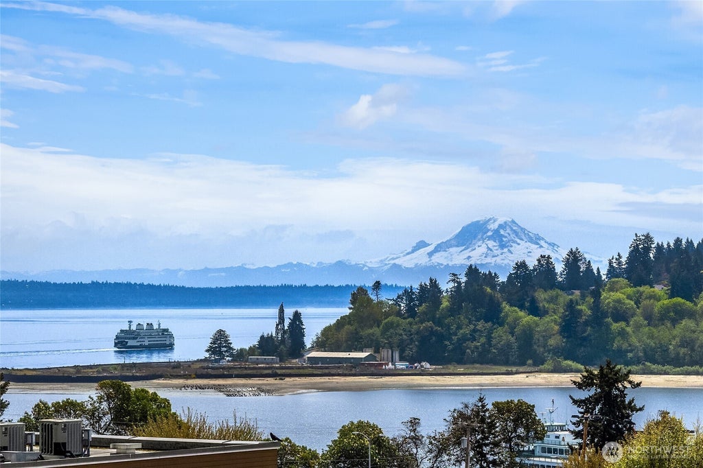 Photo of 125 Ferncliff Avenue NE #E242, Bainbridge Island, WA 98110 (MLS # 2591688)