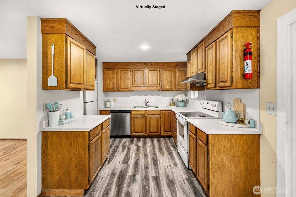 Photo of 10515 SE 232nd Street, Kent, WA 98031 (MLS # 2461577)