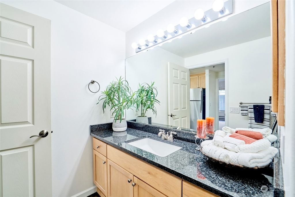 Photo of 15345 Sunwood Boulevard #D203, Tukwila, WA 98188 (MLS # 2224902)