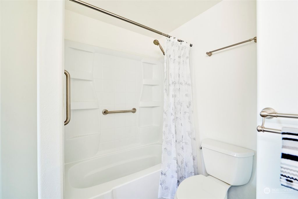Photo of 15345 Sunwood Boulevard #D203, Tukwila, WA 98188 (MLS # 2224902)