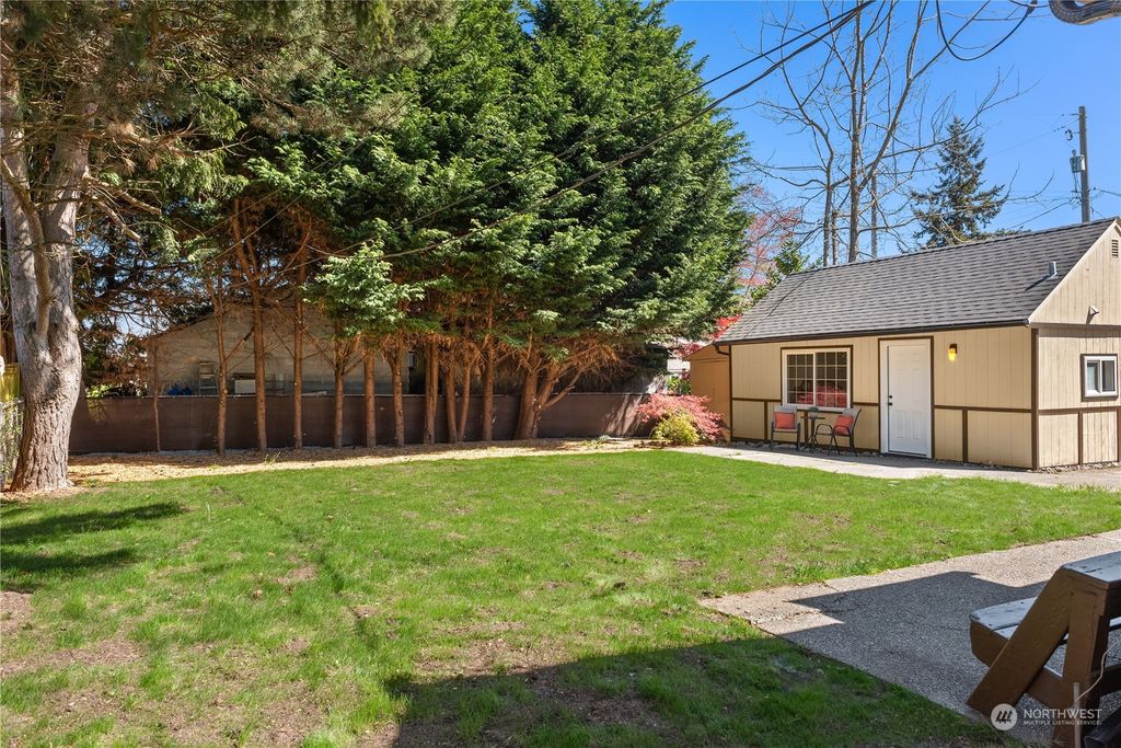 Photo of 9910 35th Avenue SW, Seattle, WA 98126 (MLS # 2225727)