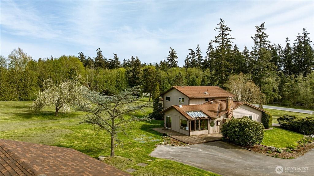 Photo of 987 E Crescent Harbor Road, Oak Harbor, WA 98277 (MLS # 2511477)