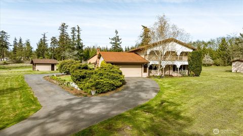 Photo of 987 E Crescent Harbor Road, Oak Harbor, WA 98277 (MLS # 2511477)