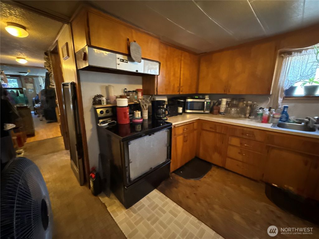 Photo of 227 Pacific Avenue S, Pacific, WA 98047 (MLS # 2438811)