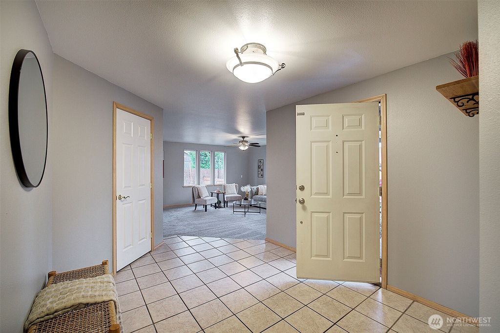 Photo of 803 3rd Avenue NW, Puyallup, WA 98371 (MLS # 2459928)