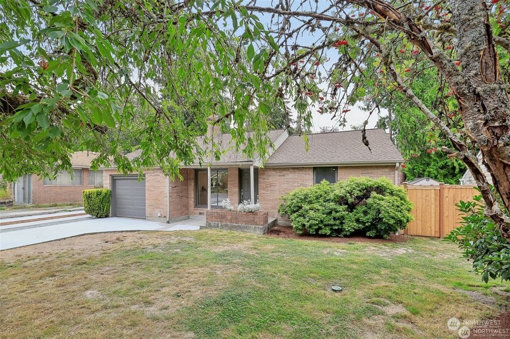 Photo of 10714 39th Avenue NE, Seattle, WA 98125 (MLS # 2302893)