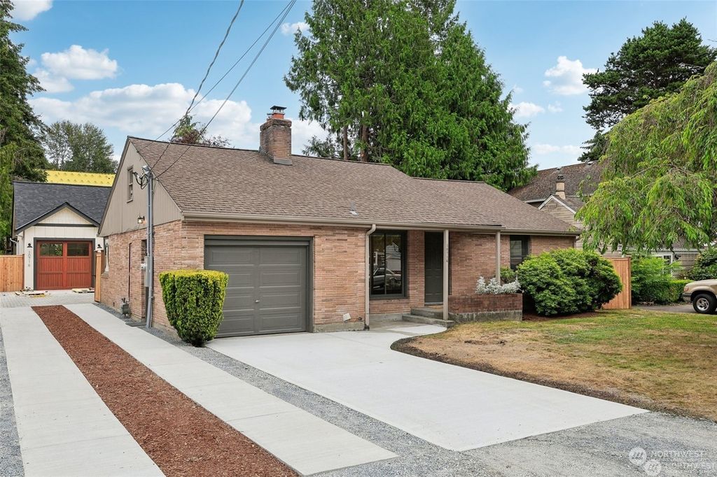 Photo of 10714 39th Avenue NE, Seattle, WA 98125 (MLS # 2302893)