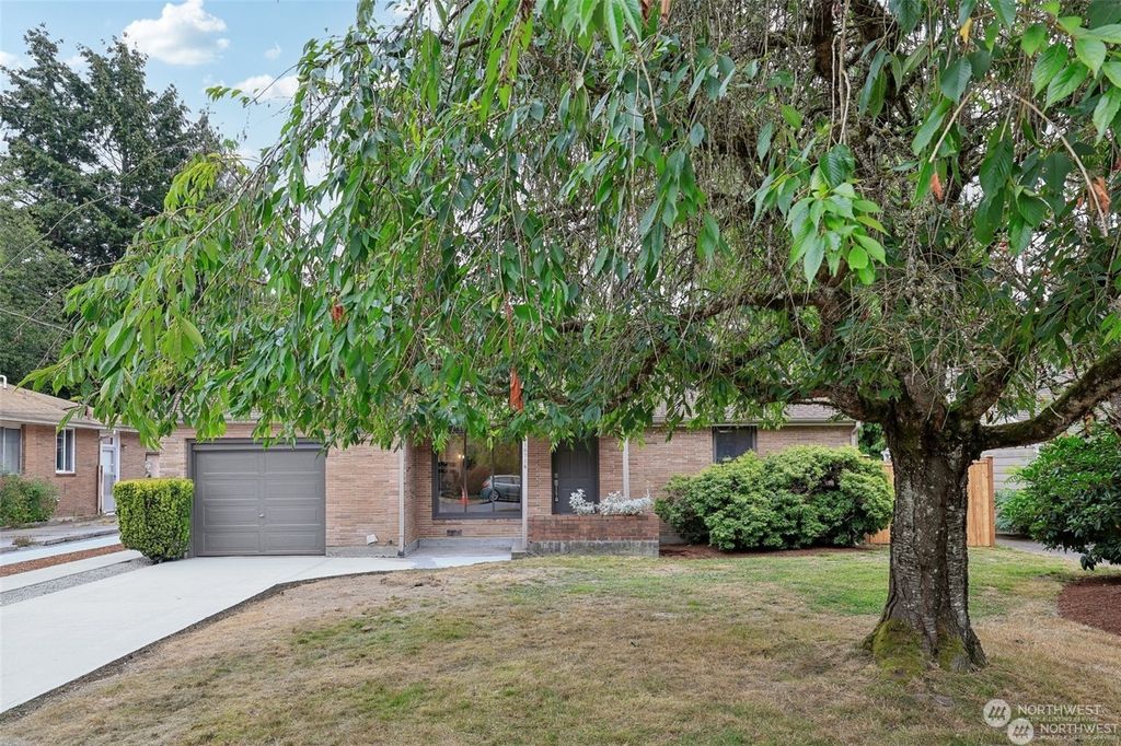 Photo of 10714 39th Avenue NE, Seattle, WA 98125 (MLS # 2302893)