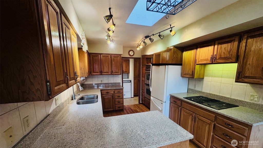 Photo of 350 E Fairway Drive, Allyn, WA 98524 (MLS # 2460218)