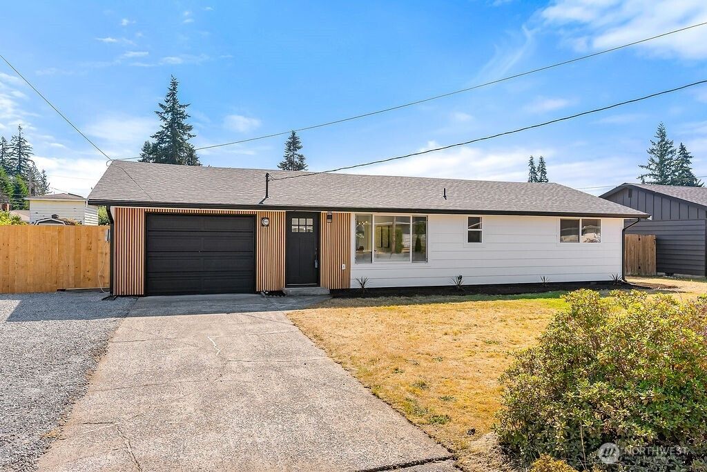 Photo of 8717 48th Drive NE, Marysville, WA 98270 (MLS # 2412041)