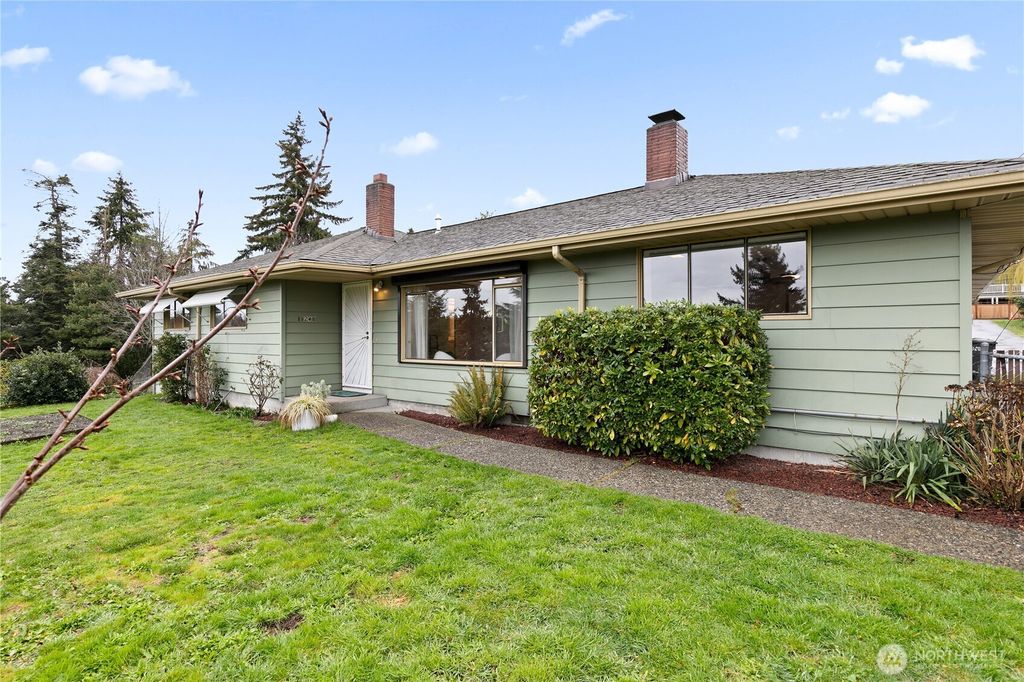 Photo of 11240 28th Avenue SW, Seattle, WA 98146 (MLS # 2343857)