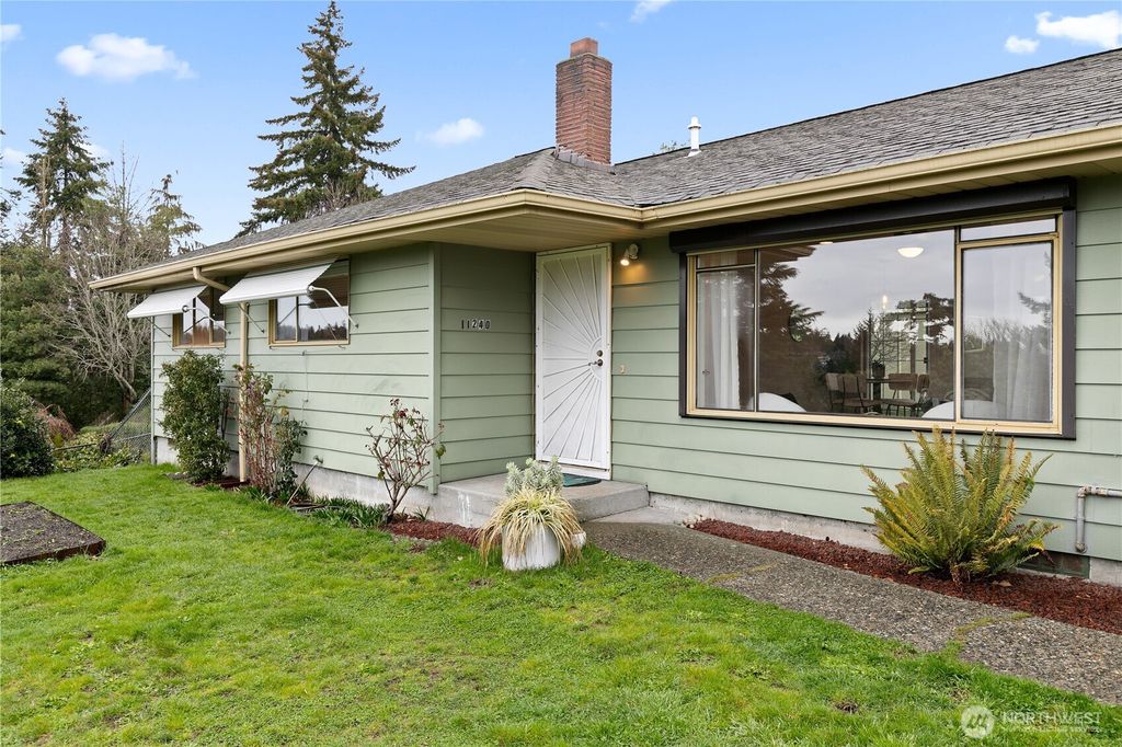 Photo of 11240 28th Avenue SW, Seattle, WA 98146 (MLS # 2343857)