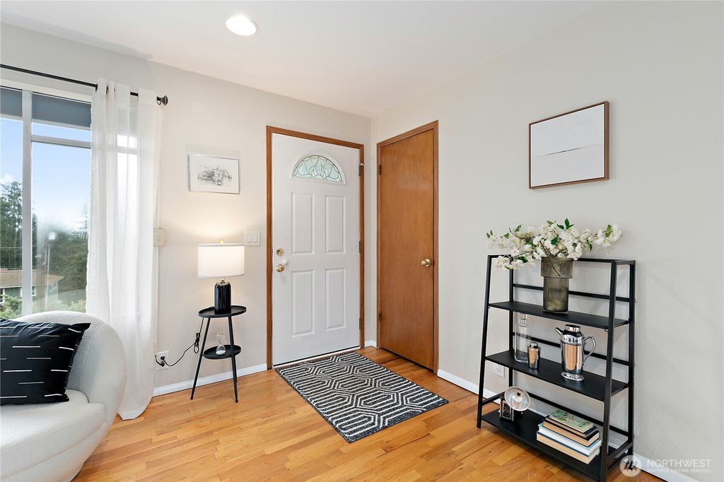 Photo of 11240 28th Avenue SW, Seattle, WA 98146 (MLS # 2343857)