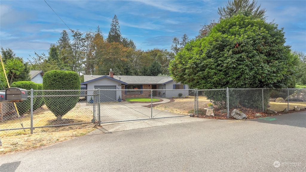 Photo of 5101 NE 3rd Street, Renton, WA 98059 (MLS # 2010779)