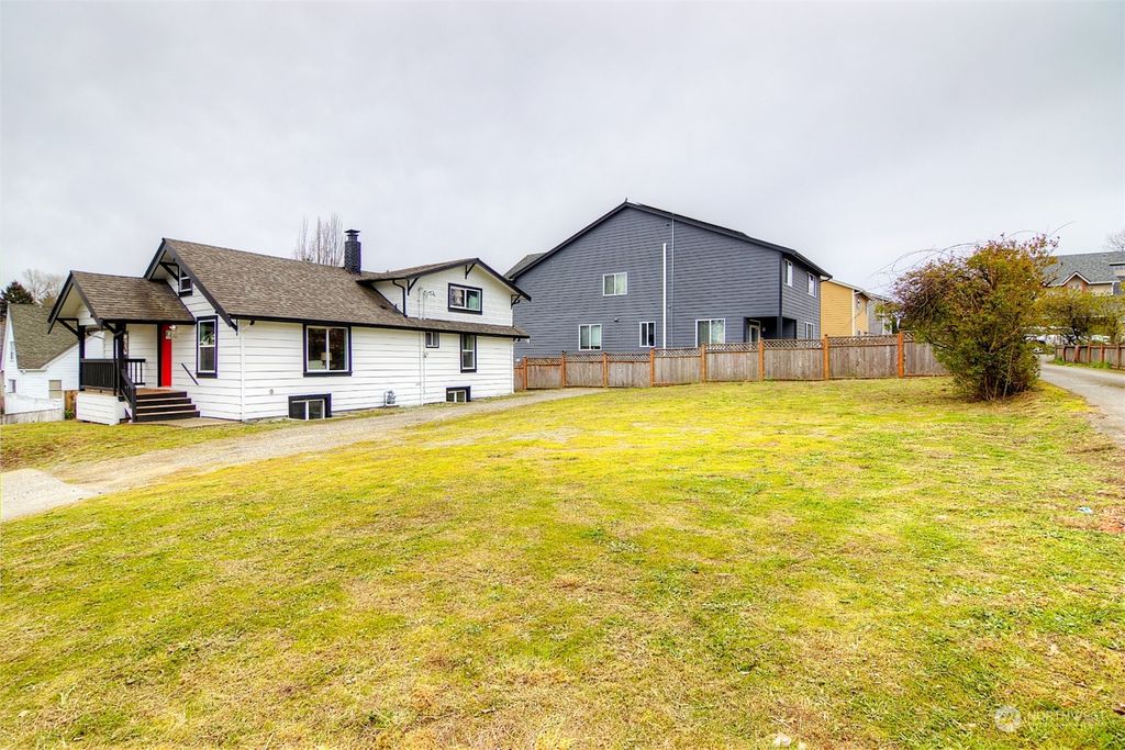 Photo of 4447 S 144th Street, Tukwila, WA 98168 (MLS # 2058674)