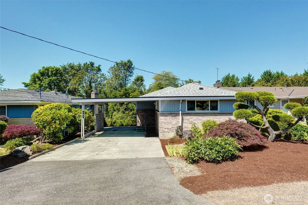 Photo of 9345 37th Avenue S, Seattle, WA 98118 (MLS # 2410840)