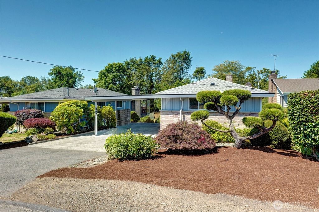 Photo of 9345 37th Avenue S, Seattle, WA 98118 (MLS # 2410840)