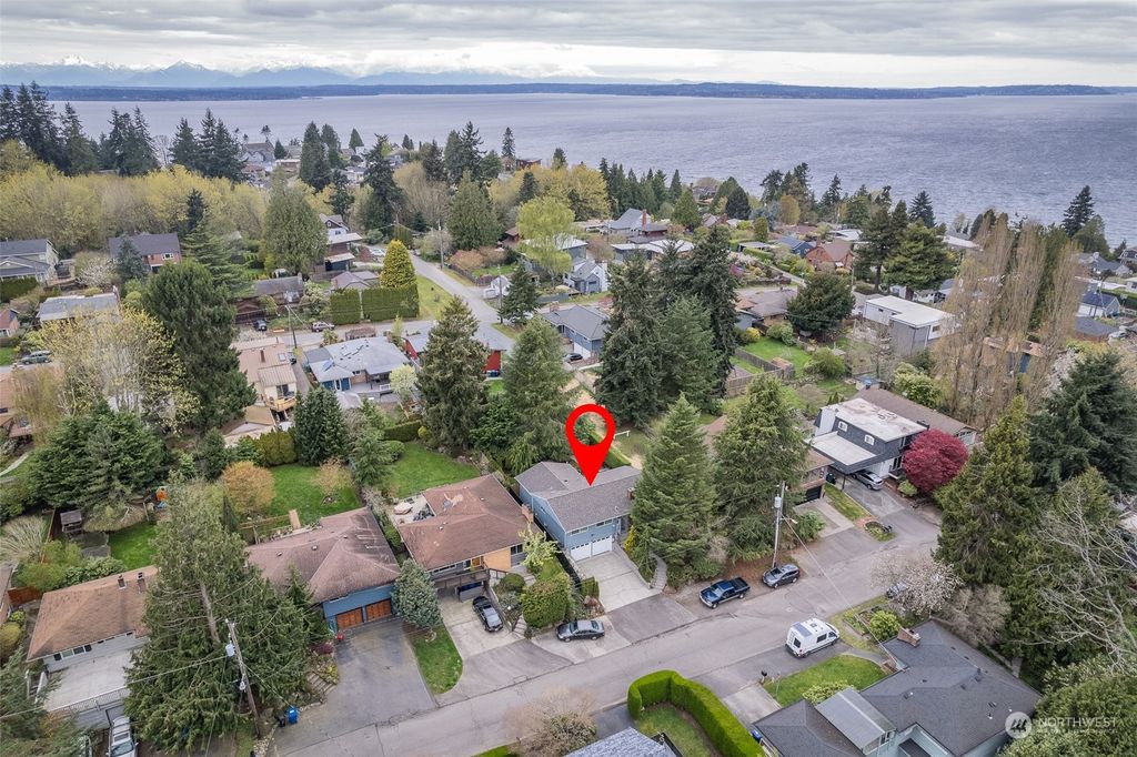 Photo of 9009 30th Ave NW Ave, Seattle, WA 98117 (MLS # 2218087)