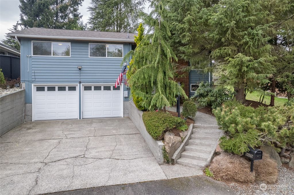 Photo of 9009 30th Ave NW Ave, Seattle, WA 98117 (MLS # 2218087)