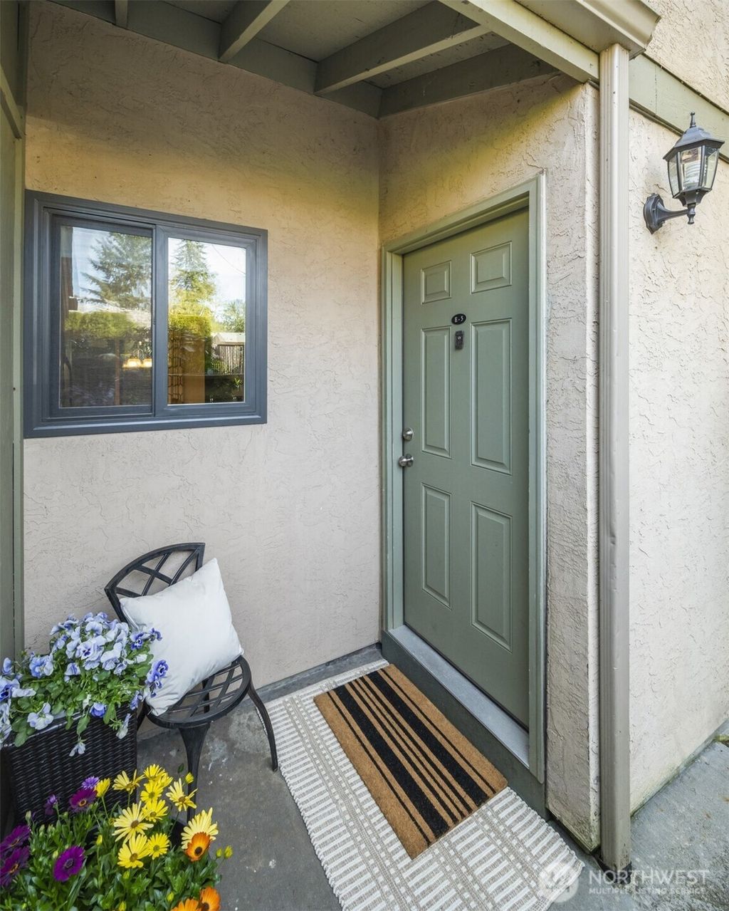 Photo of 10045 NE 138th Place #E5, Kirkland, WA 98034 (MLS # 2498924)