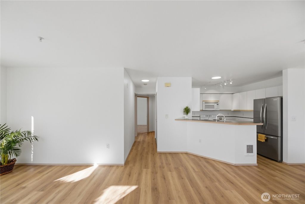 Photo of 11130 SE 208th Street #H102, Kent, WA 98031 (MLS # 2470921)