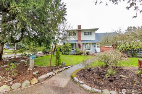 Photo of 215 E 48th St St, Tacoma, WA 98404 (MLS # 2482935)